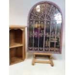 A metal arched top garden mirror with doors also with a small set of pine shelves.