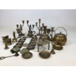 A collection of brass and Epns items including candle sticks, a pair of miniature coal scuttles, a