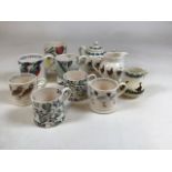 A collection of Emma Bridgewater mugs and Brixton Pottery items