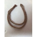 A 9 carat rose gold watch chain - hallmarked links. Weight 19gms