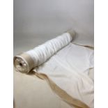 A roll of crepe with embellished gold edges. Width 105cm. Length of roll unknown but in excess of