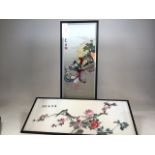 Two vintage Japanese embroidered panels, glazed and frames. Water damage to both W:87cm x H:38cm