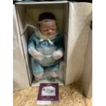 An Ashton Drake - So Truly Real - baby doll named Alex. In original box and packagin. Height