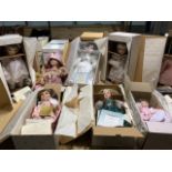 Nine Ashton Drake Gallery dolls . Eight in their original boxes and packaging. Two with chairs/