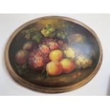 A French oval wall plaque of a still life in oils. W:46cm x H:36cm