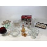 A collection of glass items to include green stem hock glasses, Crystal Sherry glasses, moulded