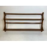 An Ercol plate rack. With Ercol sticker verso. W:96cm x H:50cm