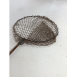 A vintage landing net with wooden handle H:165cm
