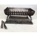 A cast iron fire grate with ash pan W:54cm x D:29cm x H:19cm