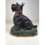 A cast metal Scottie door stop. W:31cm x D:12cm x H:32cm