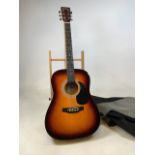 A Falcon Acoustic guitar by John Hornby Skewes & co ltd Model FG100SB