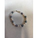 A pearl bracelet (18cm) with 14ct catch