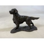 A Resin figure of a hunting dog. W:23cm x D:9cm x H:17cm