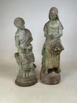A Pair of reconstituted stone garden statues of female subjects. H:71cm and H:63cm