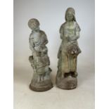 A Pair of reconstituted stone garden statues of female subjects. H:71cm and H:63cm