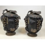 A pair of Chinese copper and bronze vases decorated with grapes and grape vines. Character to