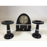A marble Art Deco clock with garnitures. Clock untested and has no glass W:21cm x H:23cm