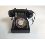 A 1940s Bakelite phone. Has been rewired but is untested. Telefonica De Lisboa & Porto. Logo AEP