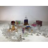 A quantity of glass items including glasses, cake stand, jugs, vase and other items