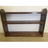 A set of chunky pine pew end bookshelves.W:130cm x D:23cm x H:91cm