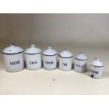 An enamel set of french storage containers - six in total. Some chips to the enamel. Tallest 20cm,