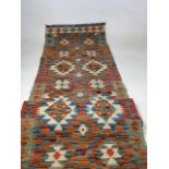 A Chobi Kilim Runner - burnt orange and blue W:59cm x H:197cm