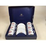 A boxed Royal Worcester Posies coffee set for six