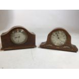 A pair of Edwardian mantle clocks. An eight day clock with inlaid mother of pearl decoration,