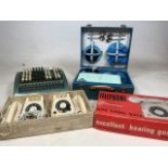 An early 20th century lot, Sumlock adding machine a telephone inter communication set and a picnic