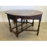 A late 18th early 19th century oak gate leg table.W:125cm x D:112cm x H:72cm