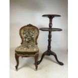 A two tier dumb waiter on turned tripod base also with a tapestry petit point chair. Dumb waiter