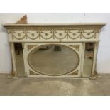 A decorative cream and gilt painted French style over mantle triptych mirror with original