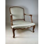 A large Queen Anne style arm chair. No cushion.