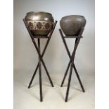 Two oriental bamboo plant stands with brass jardinieres hand painted and etched. Tallest with