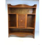 A Set of early 20th century solid oak book shelves with central cupboard. W:108cm x D:23cm x H: