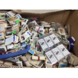 A large box of mixed cigarette and tea cards