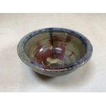 A small pottery bowl initialled K.S. W:13.5cm x H:6cm