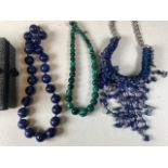Malachite and lapis lazuli necklaces and another. (3)