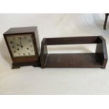A 1930s Dimra German made mantle clock in oak case with moulded finish also with an early