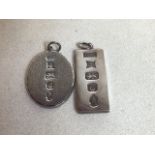 Two silver ingots style pendants. Weight approx 62gm