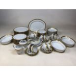 A Fairmont Fine China Linton Gold 9303 dinner service for ten. Includes dinner plates, breakfast