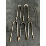 Five pairs of sugar tongs. 105 grams.