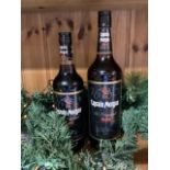 2 bottles of Captains Morgan Rum. 1 litre and 70cl.