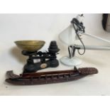 The Salter Staffordshire scales and weights, angle poise lamp and a Maori war canoe.