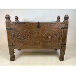 A carved tribal dowry chest. W:86cm x D:42cm x H:72cm