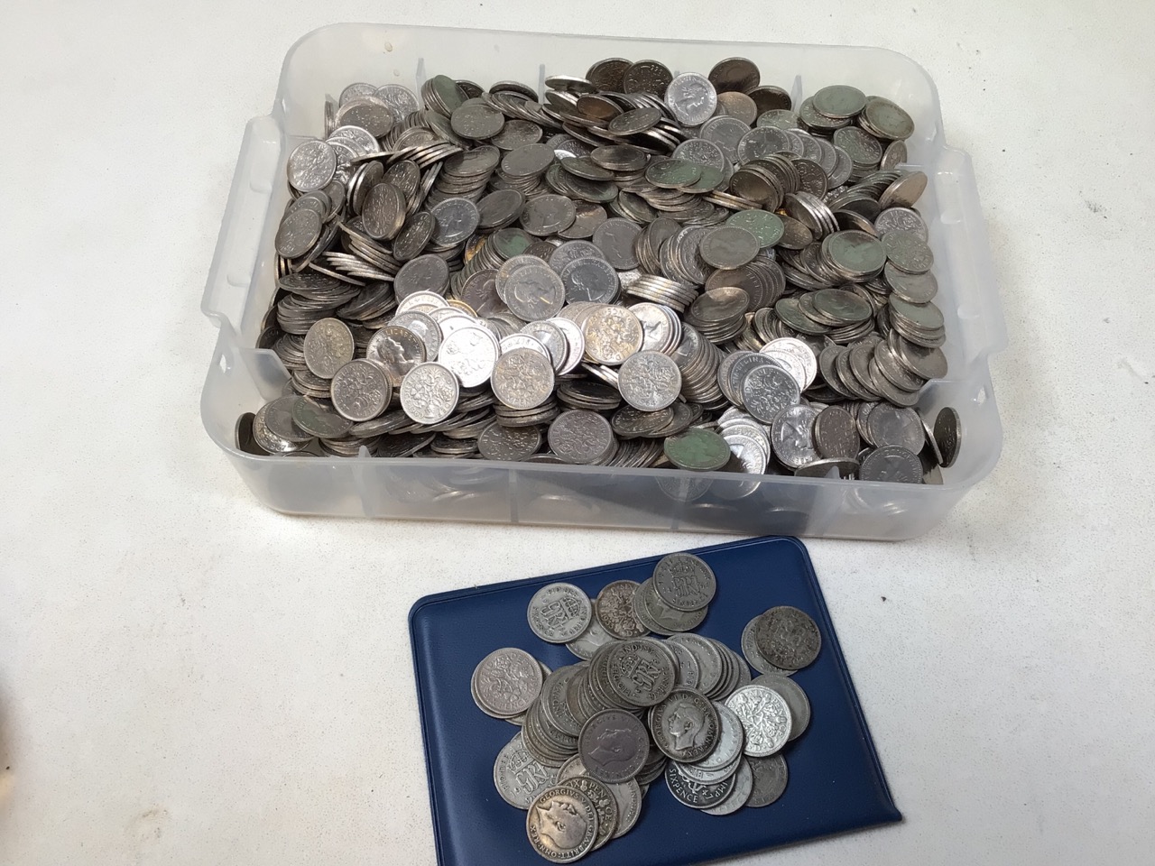 A bag of sixpence coins post 1936. Weight 3600 gms (approx) with some earlier sixpence coins