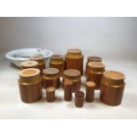Ten Hornsea Saffron storage jars - one labelled sugar, with two cruet sets together with a vintage