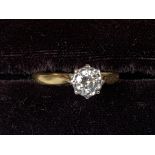A diamond solitaire ring size 6.5