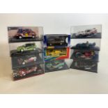 Boxed corgi Le Man and another also with boxed rally and race cars.