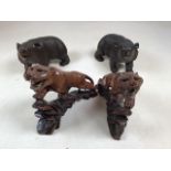 A pair of carved wooden panthers together a pair of carved bears in Black Forest style. Height of